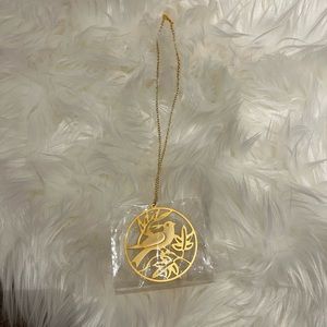 Gold bird necklace new